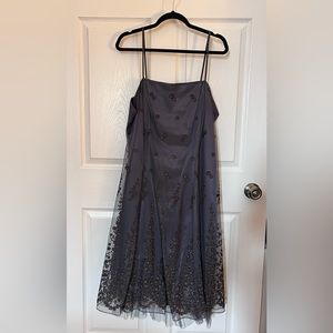 Laura Plus Cocktail dress, spaghetti strap, crinoline underlay.